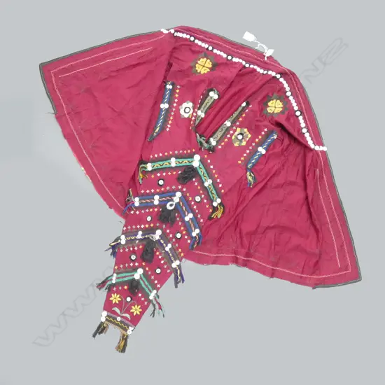 Central Asian embroidered jacket with ornamental sleeves.